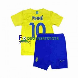 Al-Nassr Trøje Mane 10 Hjemmebane 2023-2024 Kort ærmer ,Børn Fodboldsæt